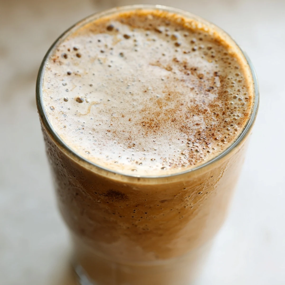 Rich coffee smoothie swirled with vanilla and served over ice for breakfast