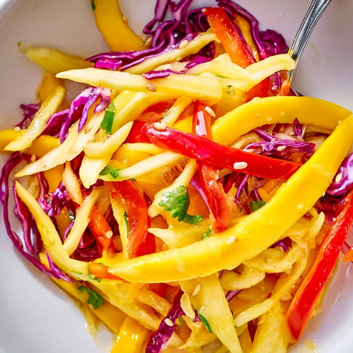 Refreshing Mango Slaw Recipe with bright lime dressing, crunchy cabbage and mango