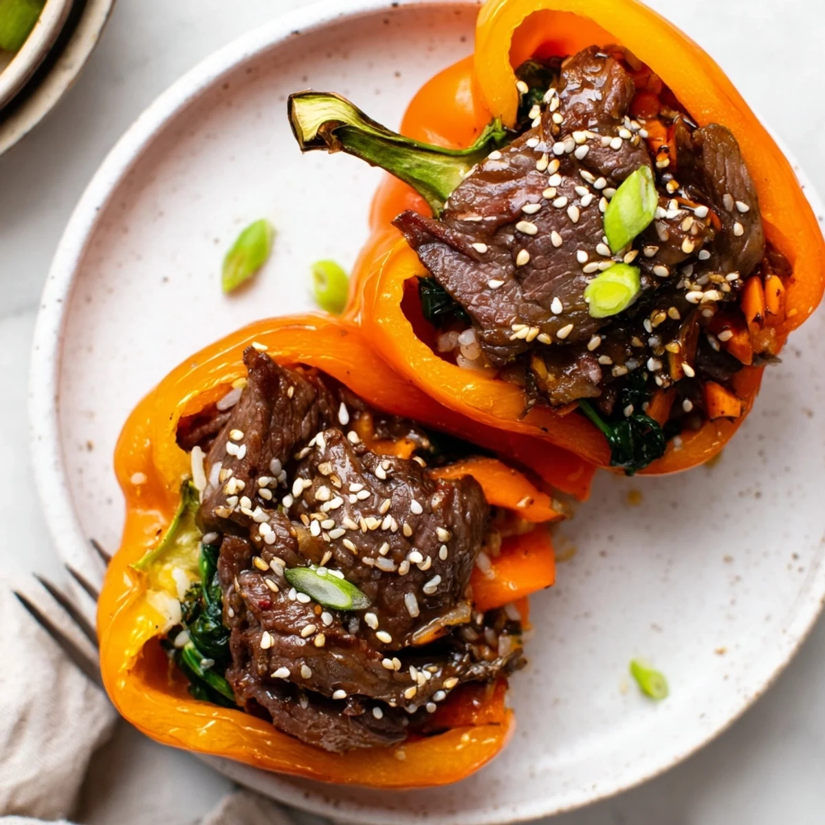 Korean Beef Bulgogi Stuffed Bell Peppers With Rice Delight, roasted and steaming.