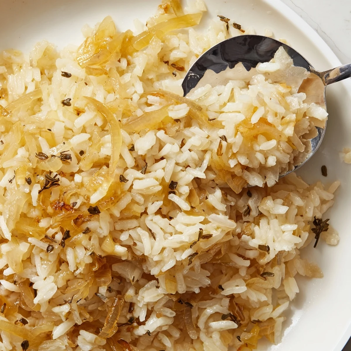 Baked French Onion Soup Rice topped with golden cheese and toasted bread